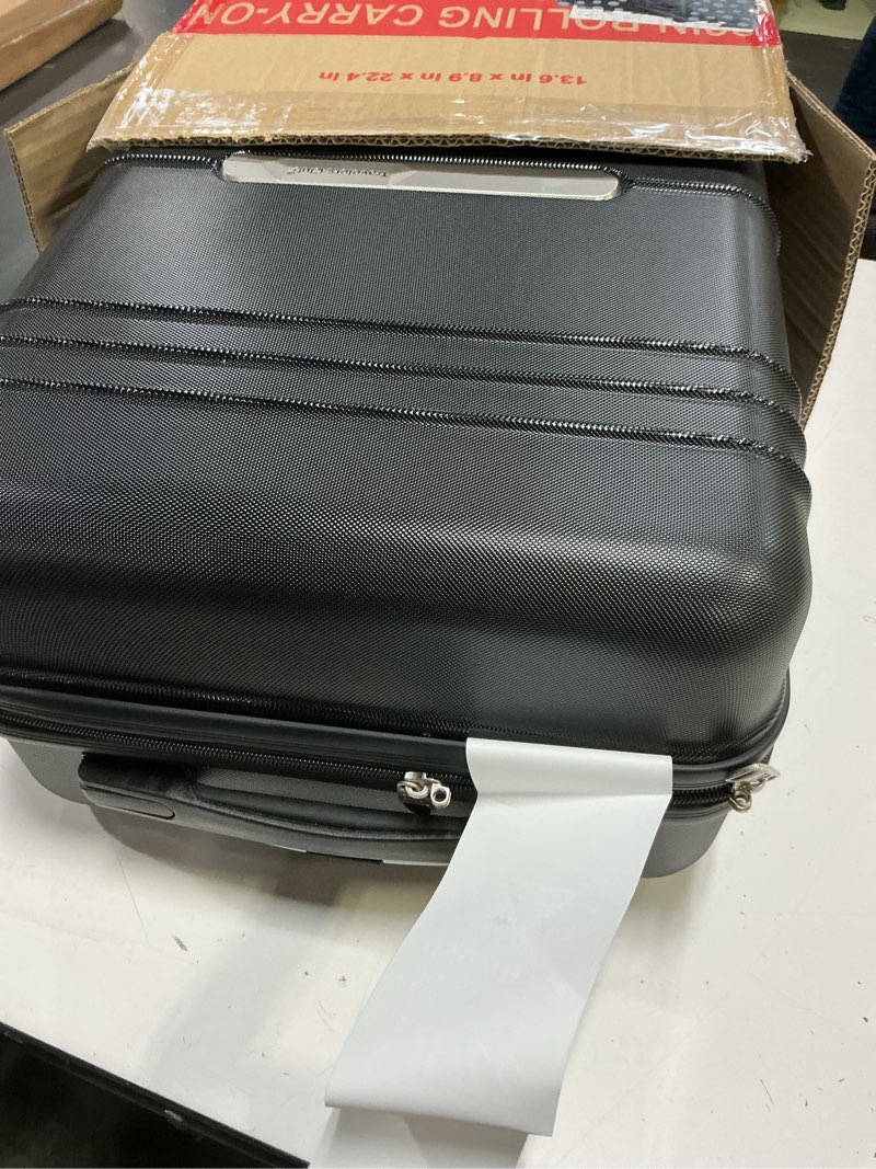 Condition photo showing Good Condition for travelers club 22" richmond spinner carry-on luggage, black