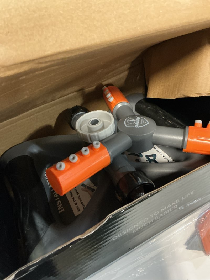 Condition photo showing As Is for joeys sprinkler for yard, rotating garden sprinkler for large area coverage, lawn and yard sprinklers (orange) gray