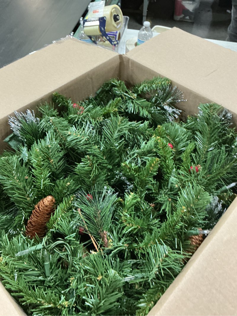 Condition photo showing Good Condition for National Tree Company 9 ft Pre-Lit Crestwood Spruce Artificial Christmas Garland, Christmas Decoration with Glitter, Pinecones, Red Berries, 50 Warm White LED Lights, 180 Tips, Timer, Green Battery Operated Tree