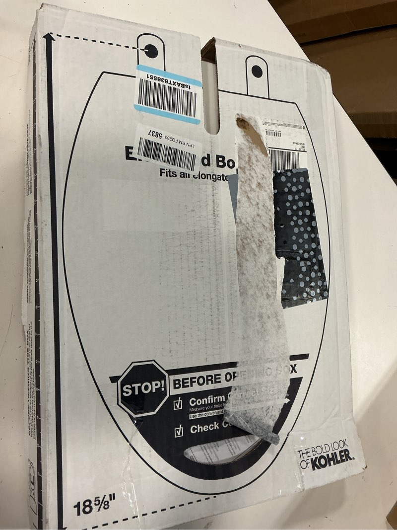 Condition photo showing As Is for kohler 20110-0 brevia, slow close toilet seat, elongated toilet seat, grip-tight bumpers quick-attach hardware, white white elongated quiet-close