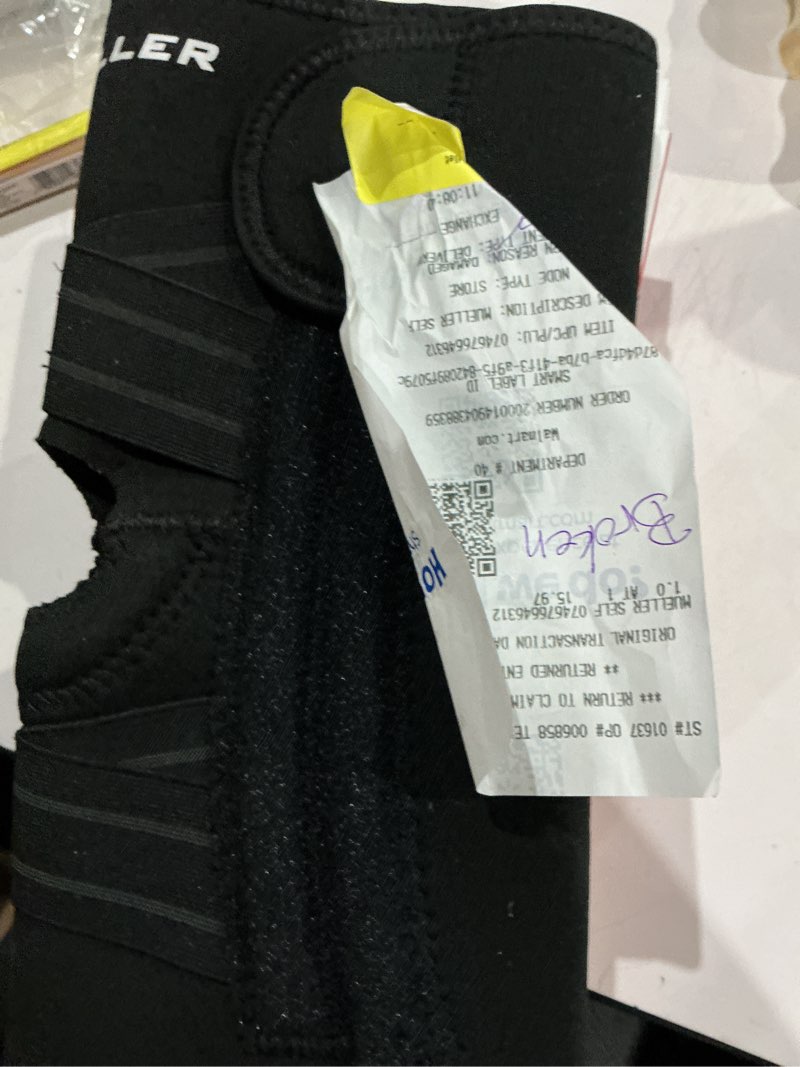 Condition photo showing Good Condition for mueller self adjusting knee stabilizer, black, one size fits most