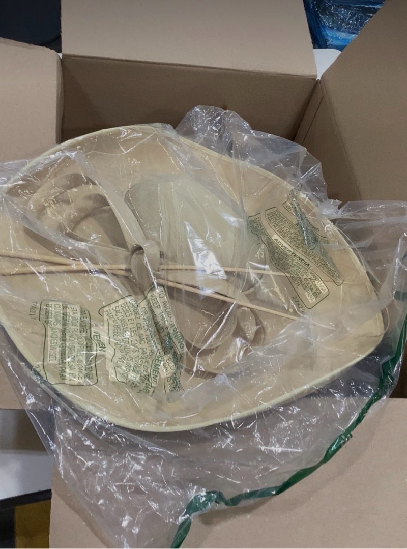 This Jessica Simpson felt cowboy hat features a macrame trim.