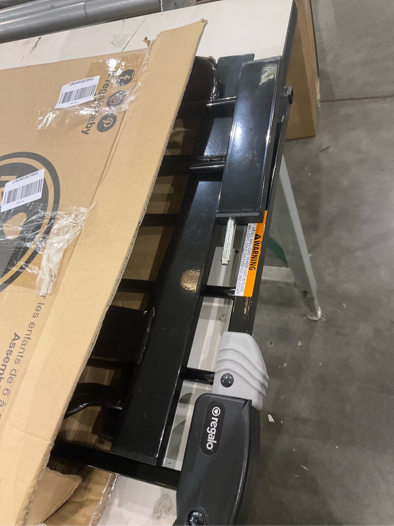 Condition photo showing Good Condition for Regalo Easy Step 38.5-Inch Wide Walk Thru Baby Gate, Includes 6-Inch Extension Kit, Pressure Mount Kit, Wall Cups, Black Black 29-38.5"W x 30"H