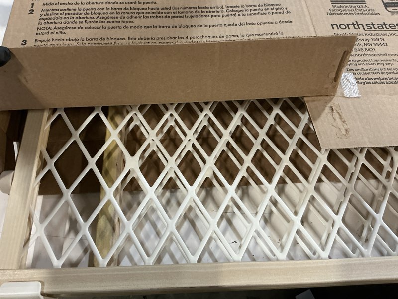 Condition photo showing As Is for north states easy adjust diamond mesh pet gate  white  wood  26.5  - 42  x 23