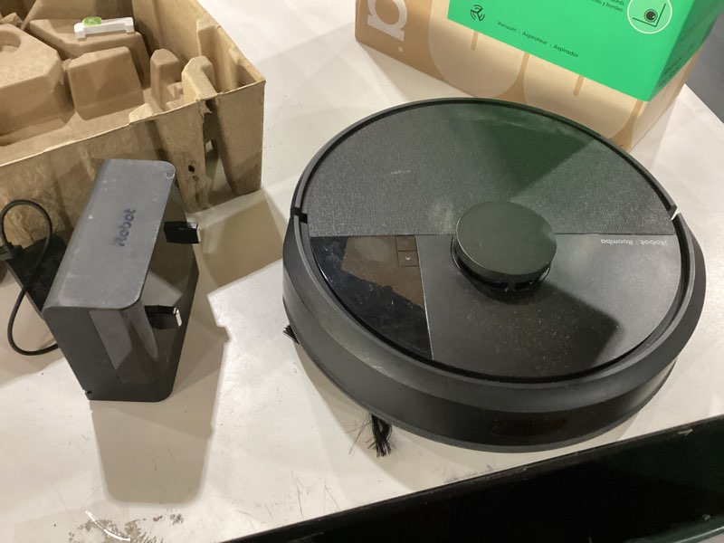 Condition photo showing As Is for *Not Tested*iRobot Roomba 104 Vac Robot Vacuum - Intense Power-Lifting Suction, Smart & Fast Home Mapping, Ideal for Pet Hair, LiDAR Navigation, Multi-Surface Cleaning, Cleans in Neat Rows, Self-Charging