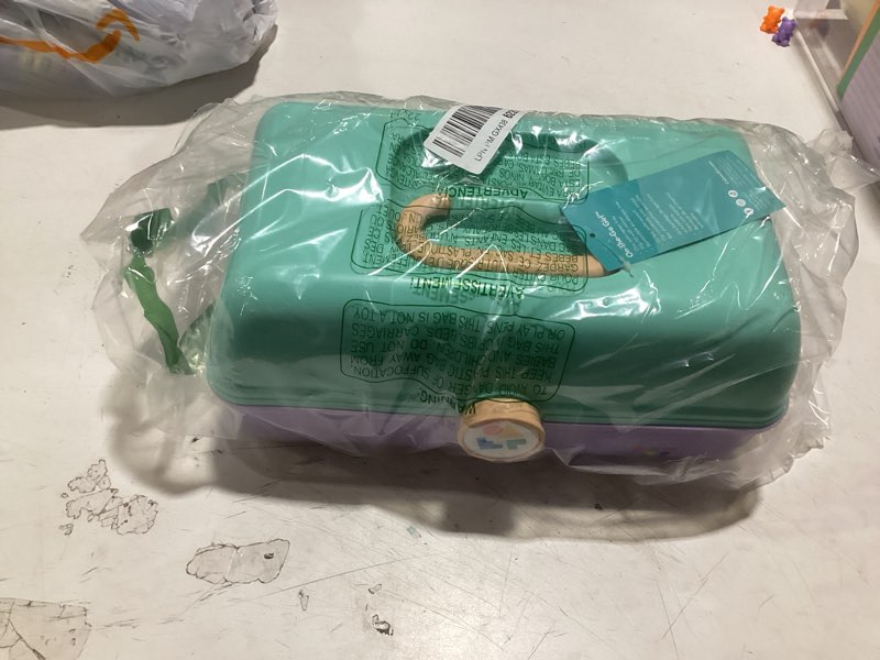 Condition photo showing Good Condition for caboodles on-the-go girl makeup box, seafoam on lavender, hard plastic makeup organizer box, built-in mirror, secure latch for safe travel, spacious storage for large items seafoam over lavender