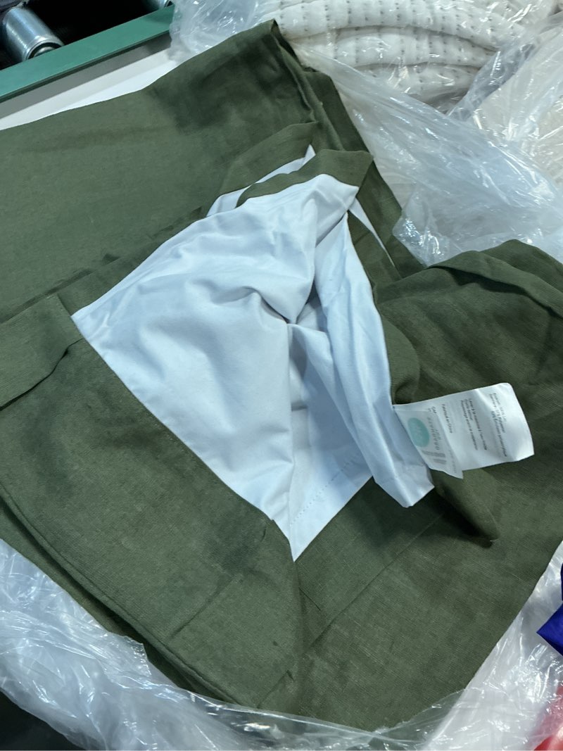 Condition photo showing As Is for european linen true blackout curtain, 48x84, hunter green