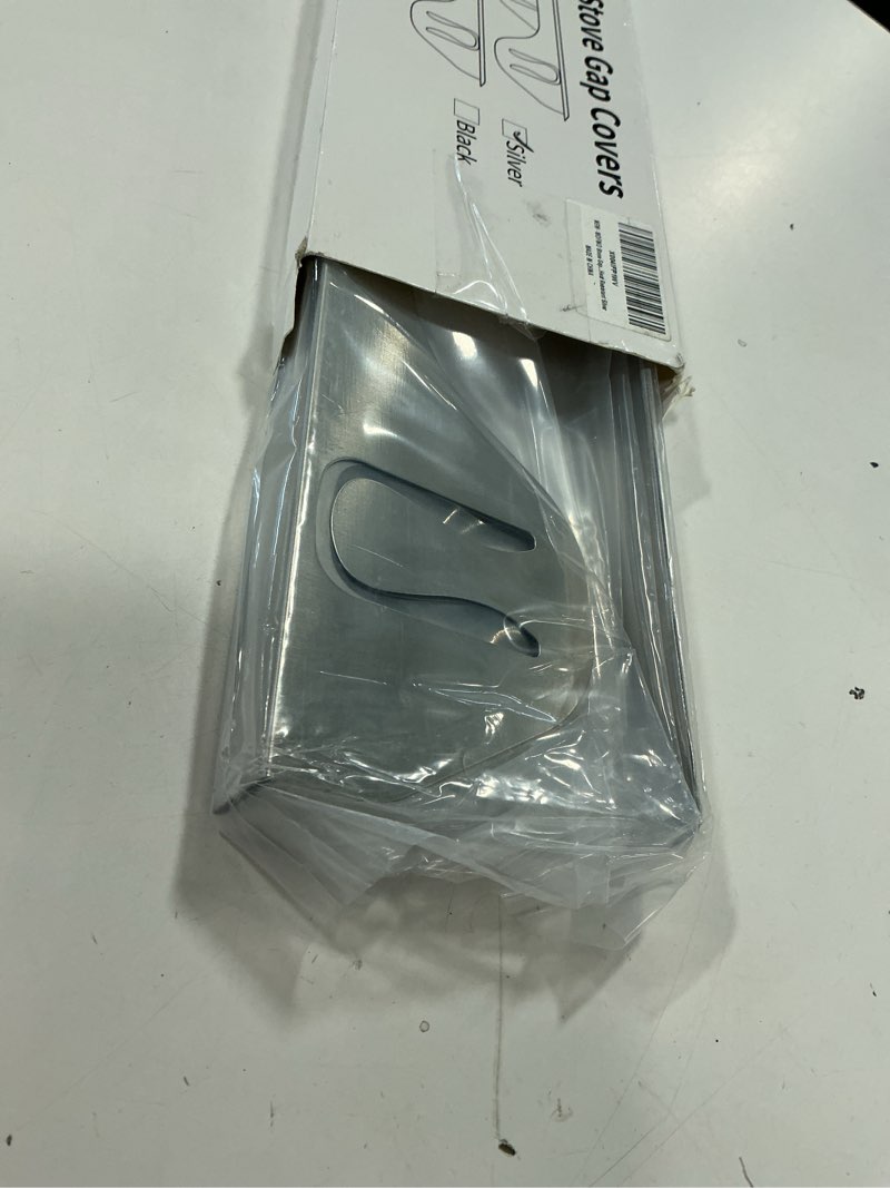 Condition photo showing Good Condition for 316 stainless steel stove gap covers,stove gap filler,range trim kit,between stove and counter for kitchen,easy retractable length 13.8" to 27.5",easy install and heat resistant (2 pack silver) 13.8" to 27.6" silver