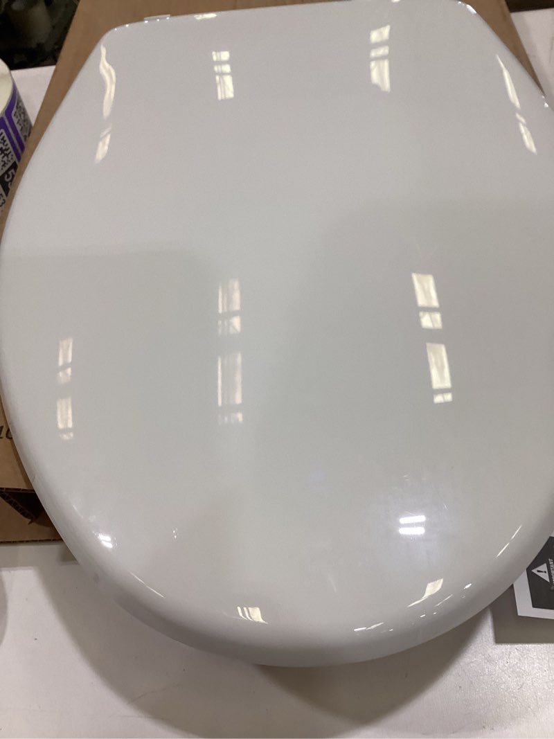 Condition photo showing Good Condition for little2big toilet seat with built-in toddler potty training seat, slow close, easy to install, made in usa, elongated, white