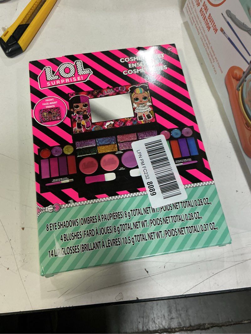 Condition photo showing New/Like New for L.O.L Surprise! All-in-One Kids Cosmetic Compact Set Includes Washable Lip Gloss, Eye Shimmer, Cheek Shimmer, Brushes Colorful Portable Beauty Set for Girls, Kids, and Toddlers Ages 3+ by Townley Girl