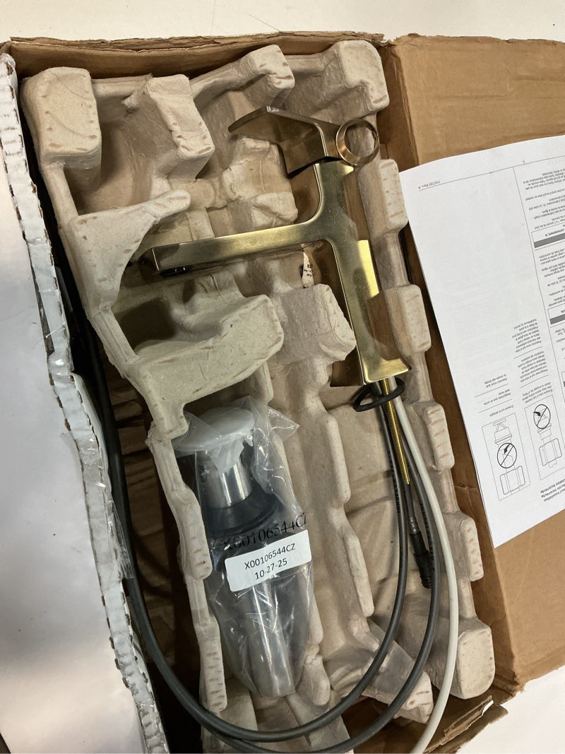 Condition photo showing As Is for Velum Single Handle Single Hole Bathroom Faucet with Deckplate Included and Drain Kit Included in Champagne Bronze