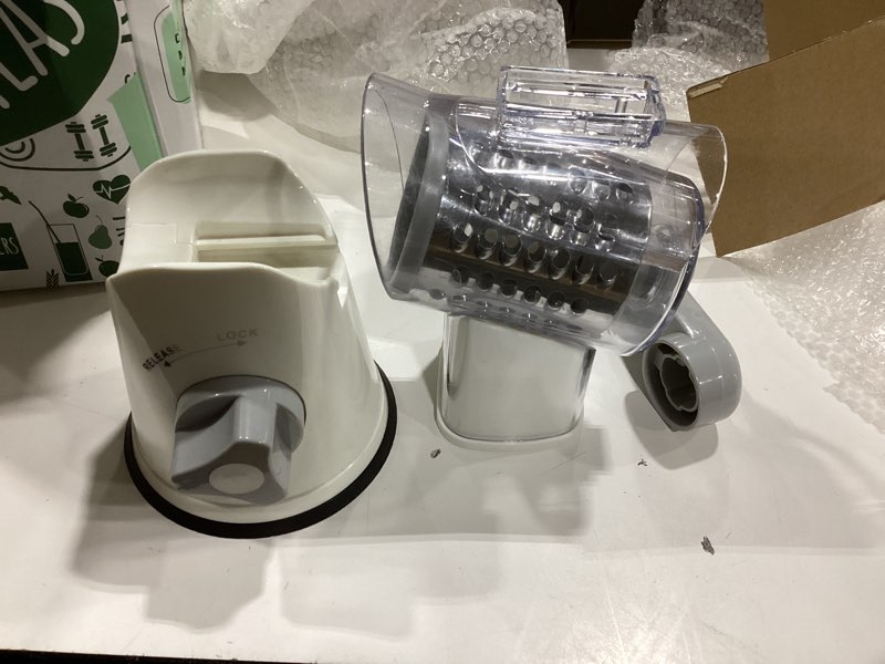Condition photo showing As Is for susteas rotary cheese grater with handle - vegetable shredder with 5 well-designed blades & strong suction base,round mandoline slicer & food chopper for kitchen,with blade storage box(retro green)