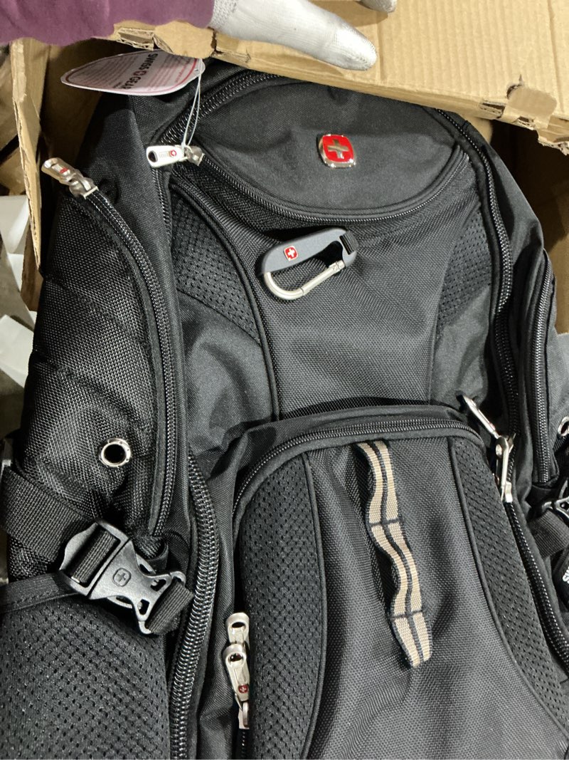 Condition photo showing Good Condition for swissgear 1186 special edition 13” laptop backpack black – compact tech bag with reflective accents – multiple organizer pockets with bungee cords & d-ring attachment point