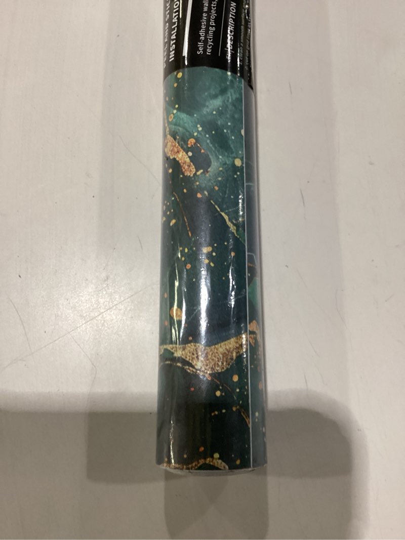 Condition photo showing New/Like New for peel and stick wall paper emerald and gold marble size unknown