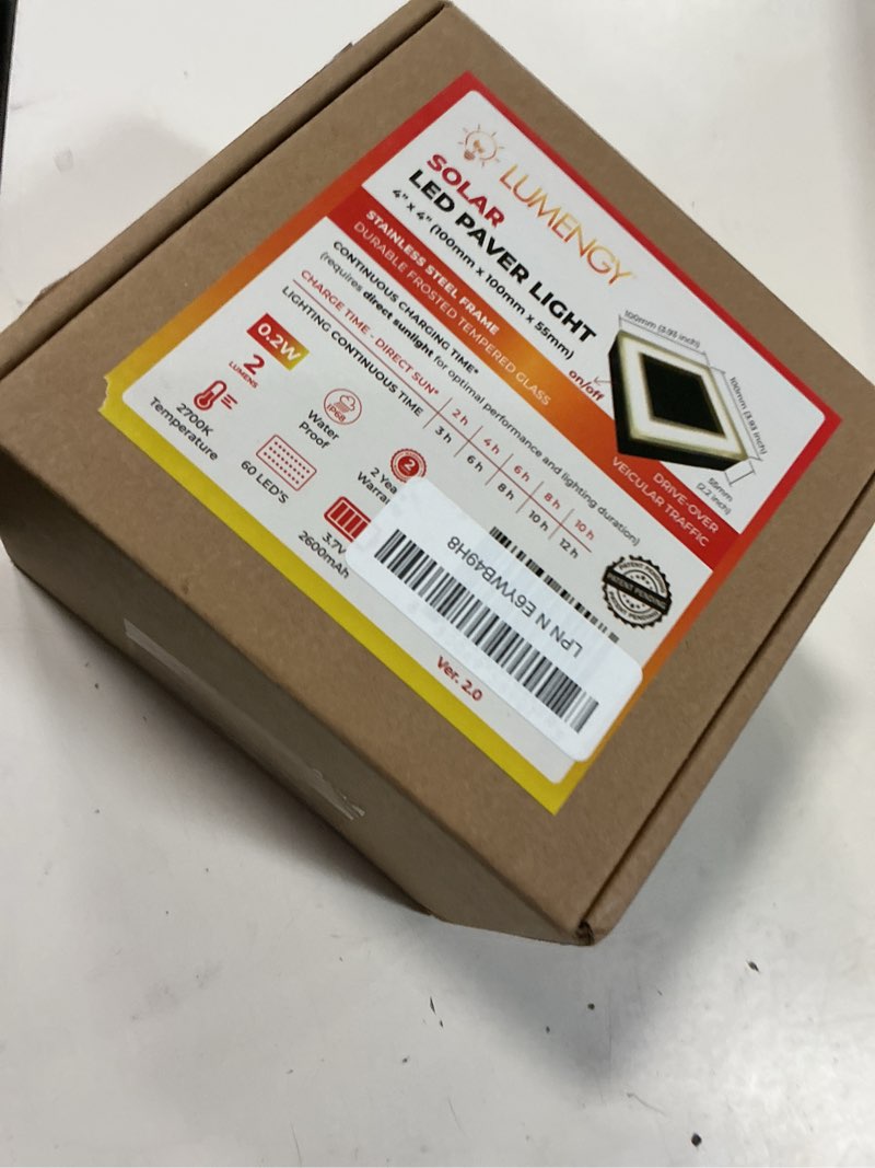 Condition photo showing New/Like New for lumengy solar paver light 4x4 inch (3.93x3.93), stainless steel with tempered glass, 2700k warm white glare-free lighting for driveways, walkways and patios, ip67 waterproof, drive-over rated v2