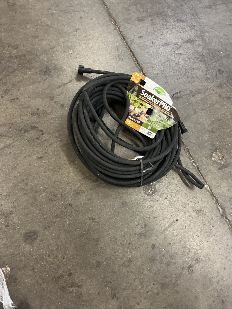 Condition photo showing As Is for element soaker 3/8" x 75' garden hose