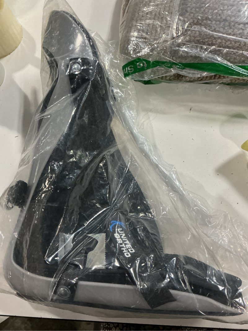 Condition photo showing New/Like New for united ortho plantar fasciitis adjustable leg support brace fits right or left foot for soreness relief, foot pain and stretching, large, black black large leg support brace