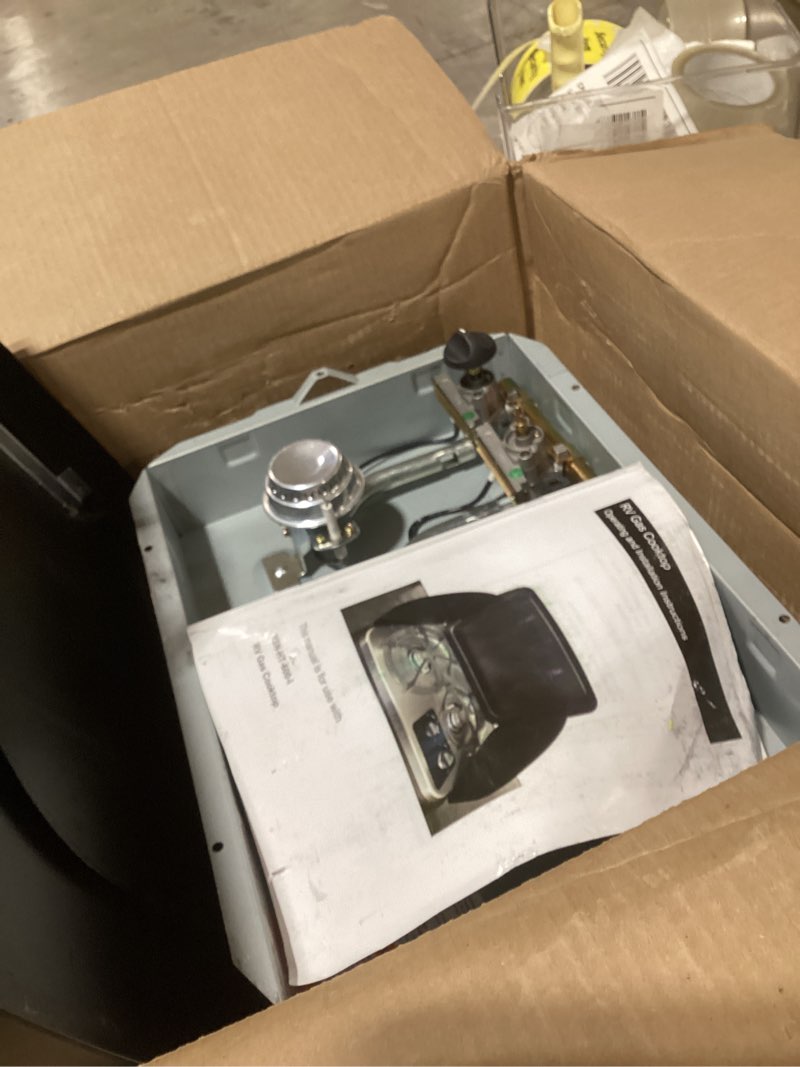 Condition photo showing As Is for Flame King YSNHT600 2-Burner Built-in RV Cooktop Propane Stove, 7200 and 5200 BTU Burners, Self-Igniting, Cover Included, Silver, 18.5" x 13" x 4.5"