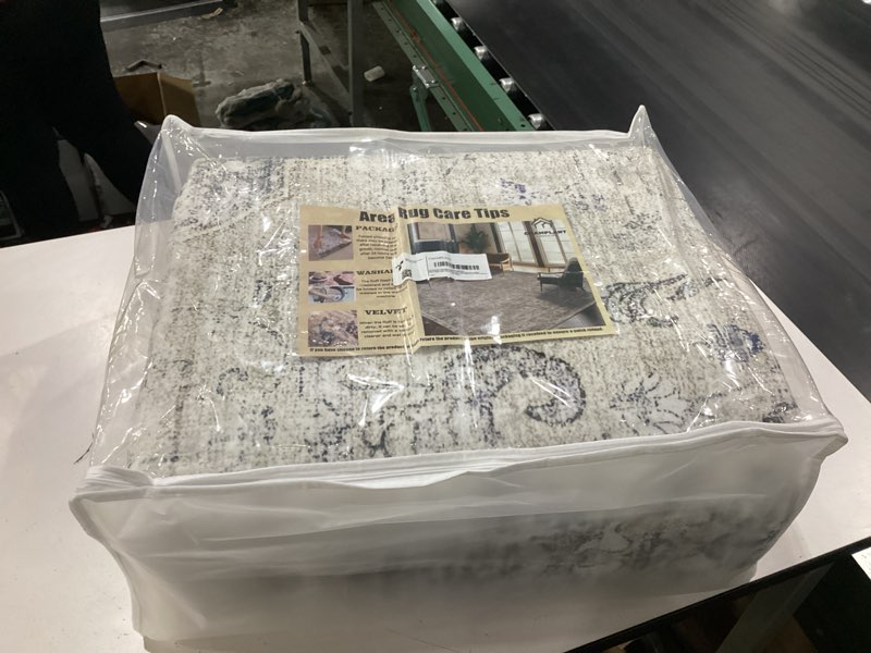 Condition photo showing New/Like New for champlant washable area rug 10'x14' floral blue boho design non-shedding easy care ideal for high traffic areas in living room bedroom office coffee table kitchen large carpet floral blue 10' x 14' (rectangular)