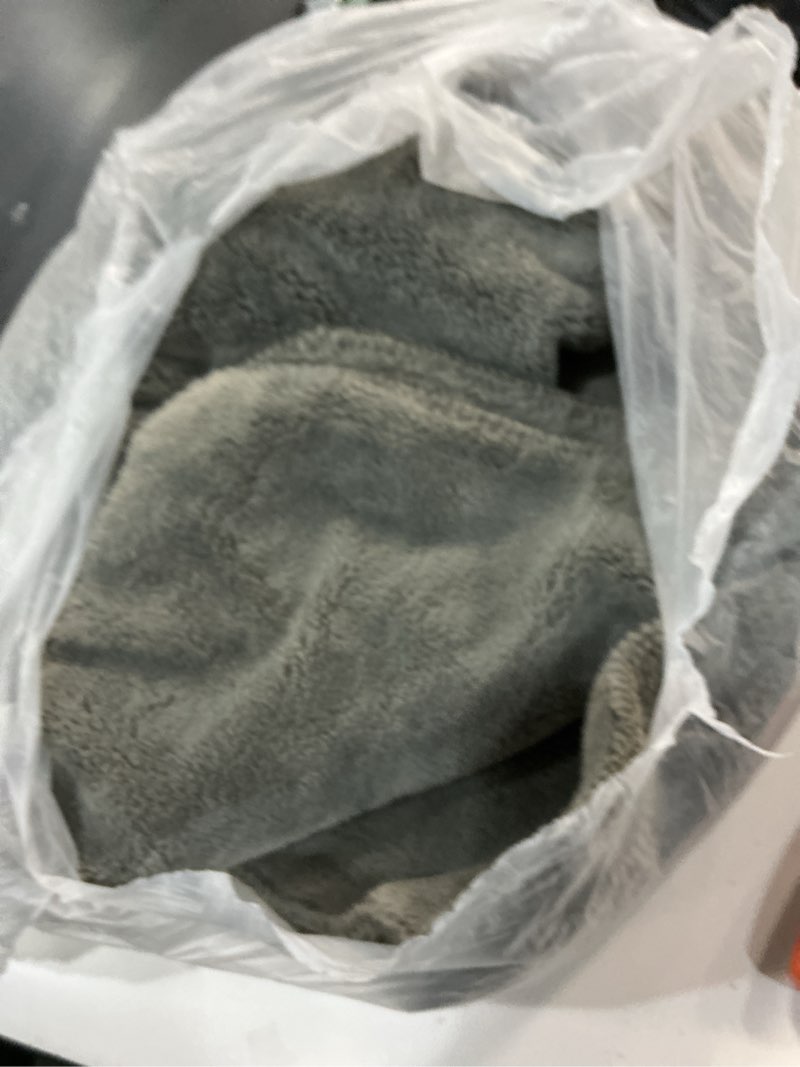 Condition photo showing As Is for UGG Whitecap Fleece Throw Blanket, Soft Fluffy Blankets for Couch or Bed, Home Decor, Luxury Plush Throw, Machine Washable, 50-inch x 70-inch, Light Grey Seal Throw Grey