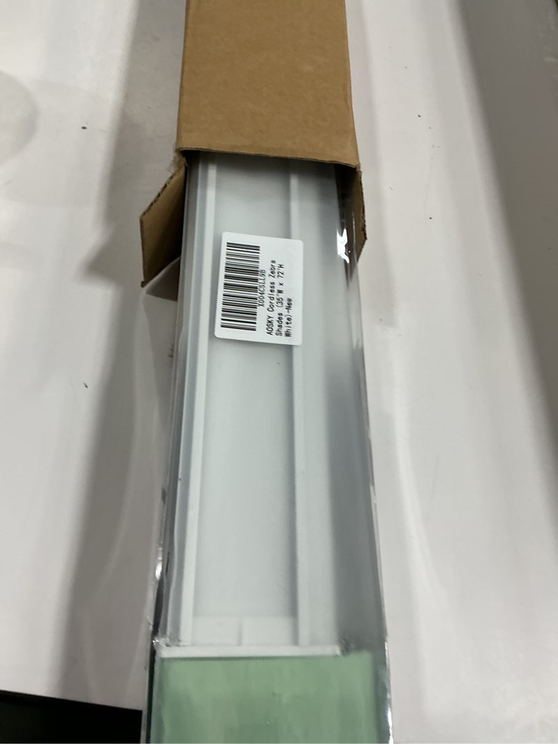 Condition photo showing Good Condition for AOSKY Cordless Roller Shades Blackout Blinds for Windows Room Darkening Rolled Up Shades with Spring System, UV Protection Window Shades Door Blinds for Home and Office (26" W x 72" H, Black) 26"W x 72"H Black