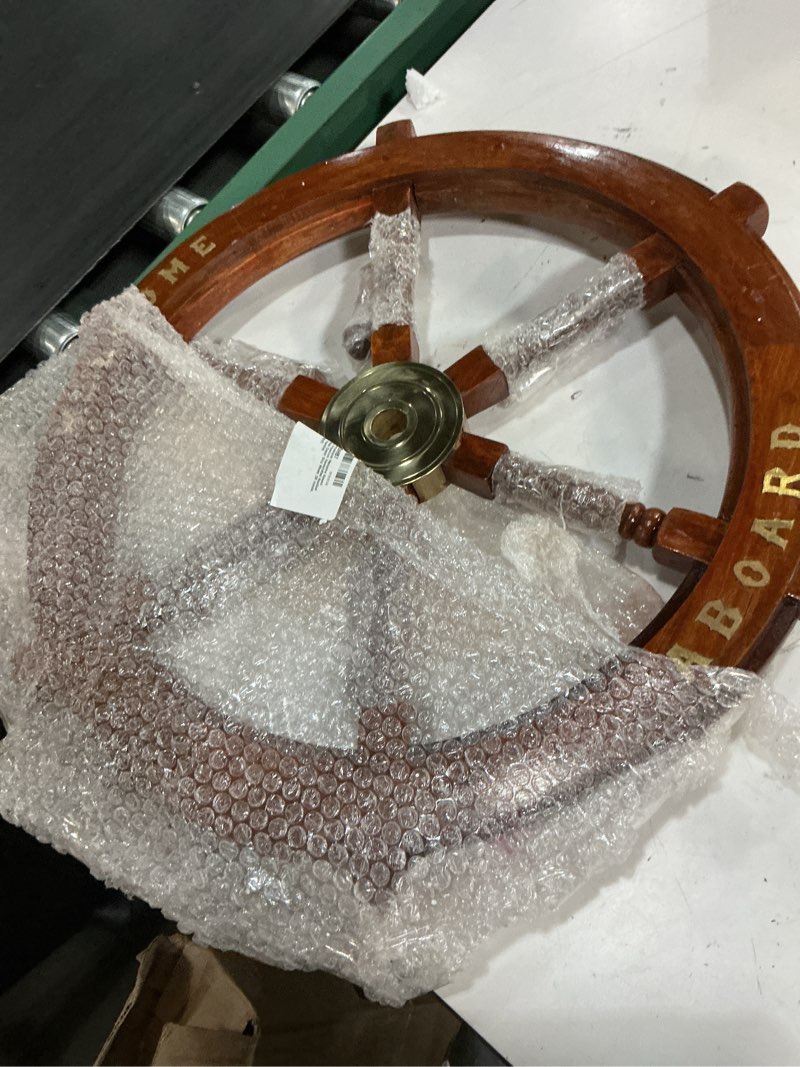 Condition photo showing As Is for nagina international welcome aboard embedded premium handcrafted nautical pirate's wall decor ship wheel (30 inches, wooden handle) 30"l x 30"w wooden handle