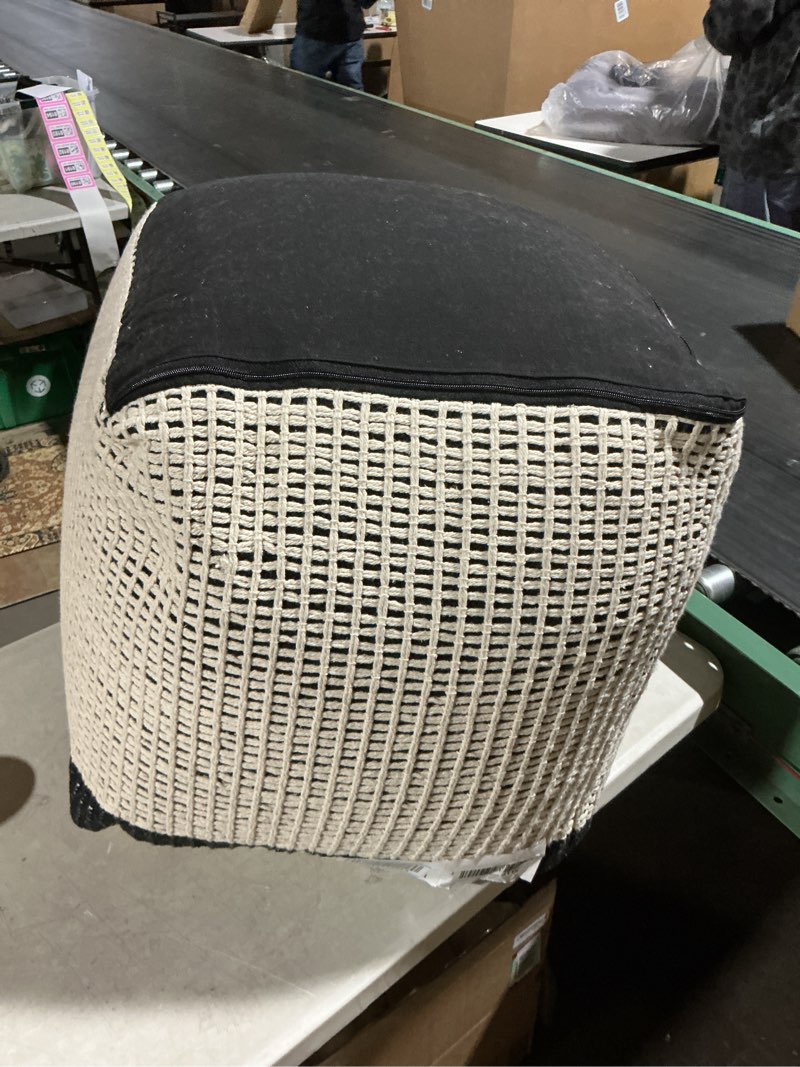 Condition photo showing As Is for Loloi II LPF0040 Black/Ivory 18'' W x 18'' D x 18'' H Pouf