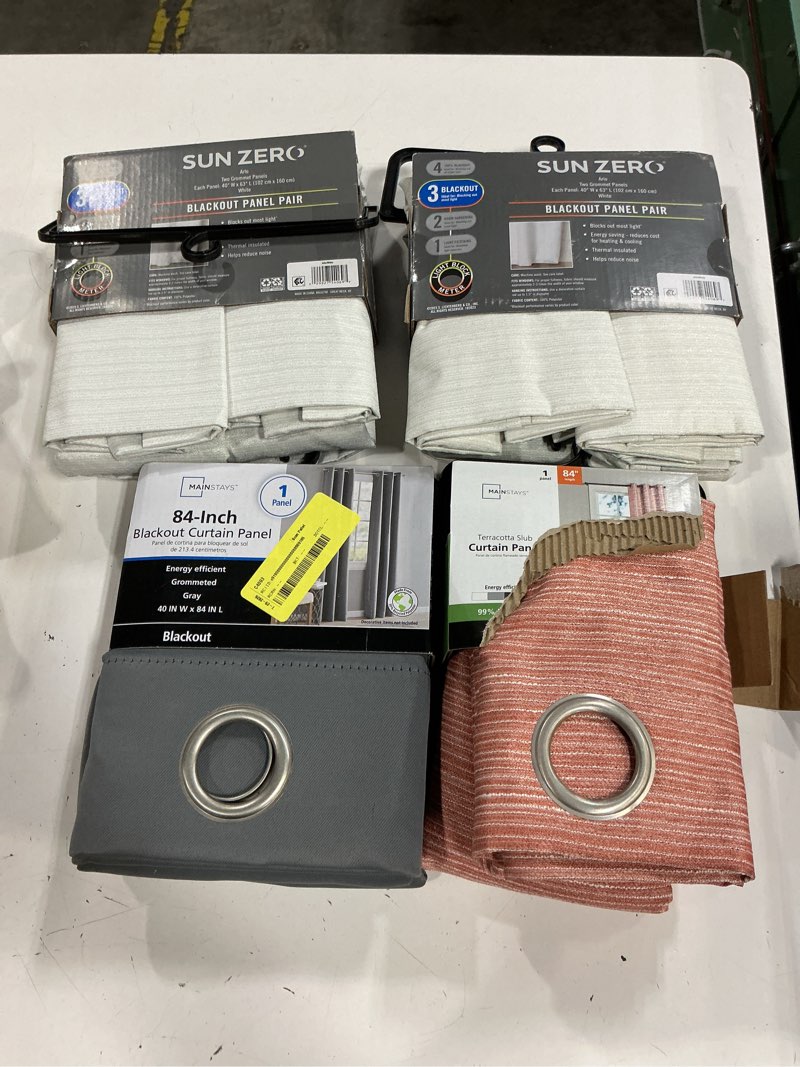Condition photo showing New/Like New for assorted small home decor curtain panels (varity colors
