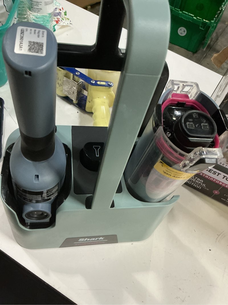 Condition photo showing As Is for shark stainforce cordless portable spot, stain, & odor remover system for carpets, area rugs, upholstery, stairs, with storage caddy, accessories, and full-size cleaning solution, hx101 (new) stainforce cordless stain system
