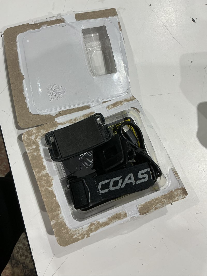 Condition photo showing As Is for coast wph20r 2000 lumen rechargeable led headlamp with clip and magnetic end cap, ip67 waterproof