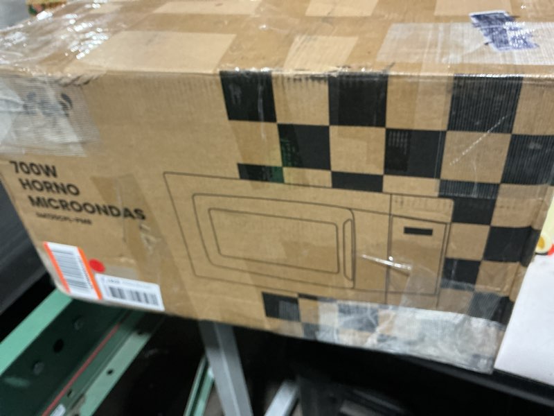 Condition photo showing Good Condition for comfee' em720cpl-pmb countertop microwave oven with sound on/off, eco mode and easy one-touch buttons, 0.7cu.ft, 700w, black