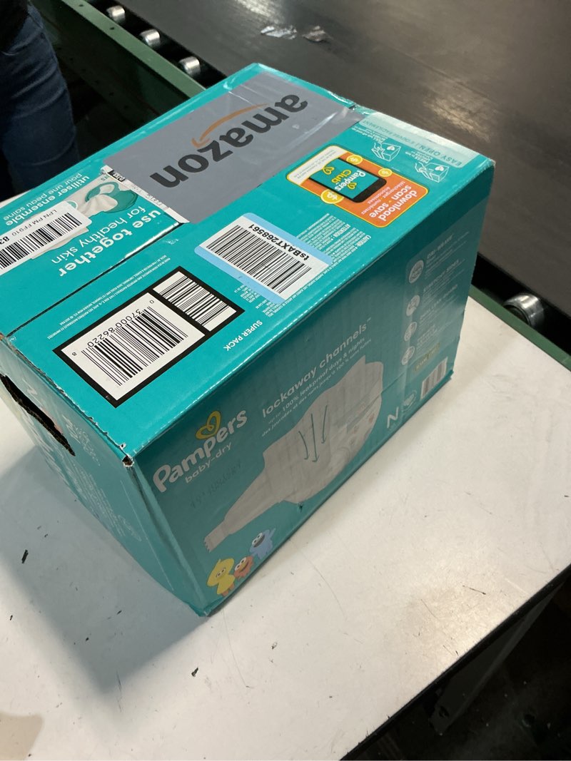 Condition photo showing New/Like New for Pampers Diapers - Baby Dry - Size 0, 104 Count, Absorbent Disposable Newbort Diaper (Packaging May Vary) Newborn 104