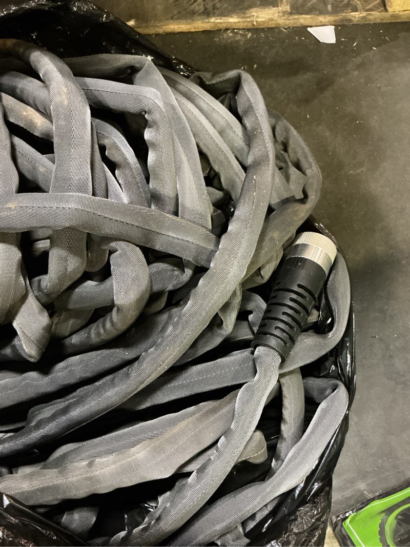 Condition photo showing As Is for teknor apex zero-g 5/8 in. d x 100 ft. l heavy duty commercial grade garden hose