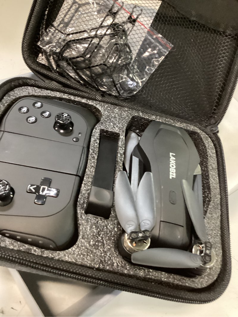 Condition photo showing As Is for foldable mini drone with 2k camera & 4.5" screen - portable pocket drone for adults and kids, includes follow me, gesture-controlled selfie, key takeoff, propeller guards and detachable lanyard