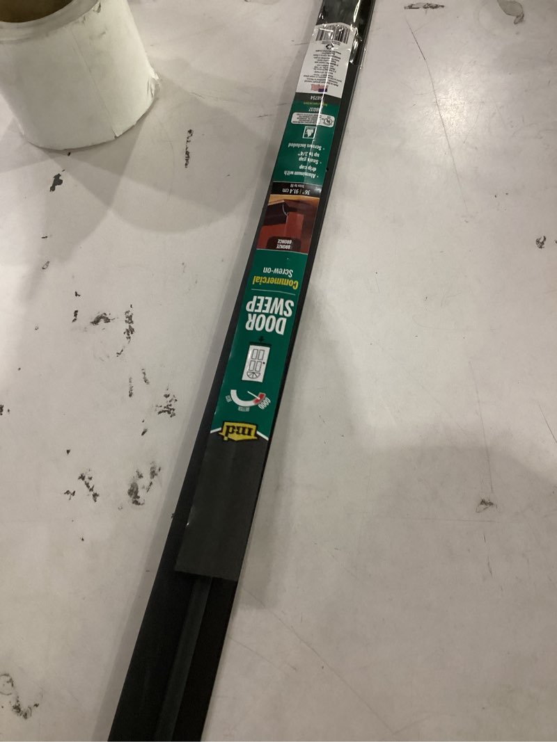 Condition photo showing Good Condition for m-d building products 68734 36 in. bronze aluminum & vinyl with drip cap commercial screw-on door sweep