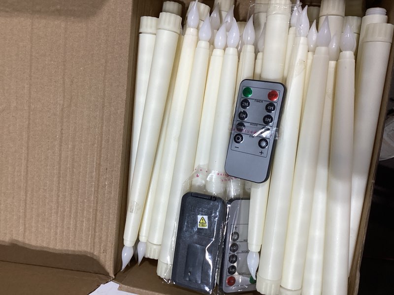 Condition photo showing As Is for tuanse 50 pcs flameless taper candles with remote timer and dimmer ivory battery operated candlesticks led flickering flameless candle for wedding home christmas halloween party decor(9.7 inch)