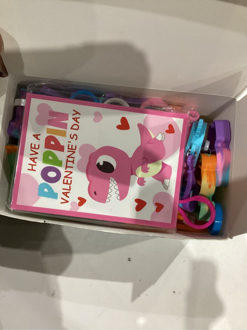 Condition photo showing Good Condition for jumlys valentines day cards for kids school, 24 pack pop fidget keychains bulk, valentine day party favors for boys girls, ideal exchange cards for classroom