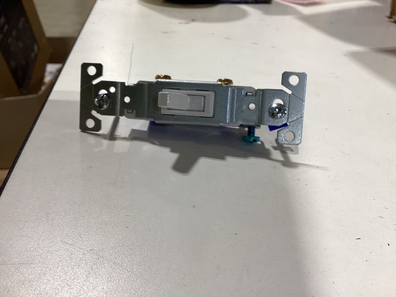 Condition photo showing New/Like New for eaton 15-amp single-pole toggle light switch, white