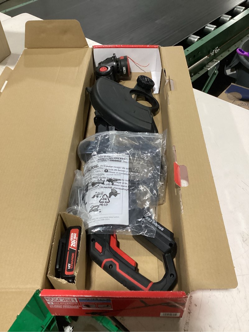 Condition photo showing As Is for hyper tough 12" 20v brushless cordless string trimmer with 20v max 2.0ah battery and charging cable