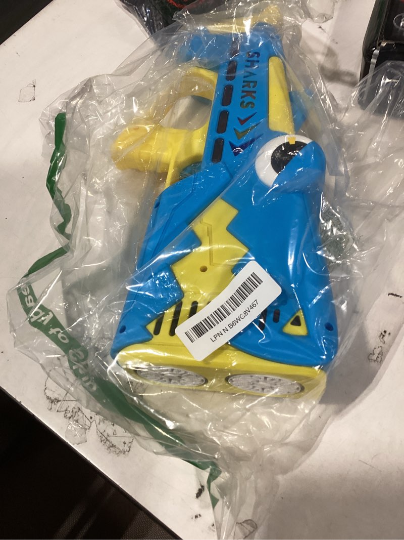 Condition photo showing Good Condition for bubble gun for kids ages 4-8: shark light up bubble machine for toddlers, rechargeable, 2 bubble solution, outdoor toy party birthday gift for 3 4 5 6 7 8 year old