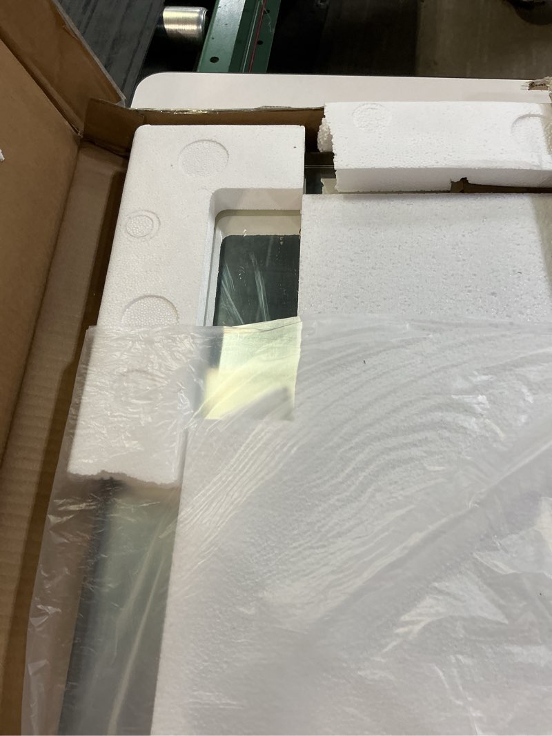 Condition photo showing Good Condition for LOAAO 24”X32” Bronze Bathroom Mirrors for Vanity, Rounded Rectangle Brushed Bronze Metal Frame Mirror, Anti-Rust, Hangs Horizontally or Vertically Bronze 24"L x 32"W