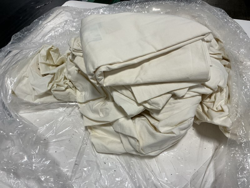 Condition photo showing As Is for organic brushed cotton deluxe bedding bundle, cal king, ivory