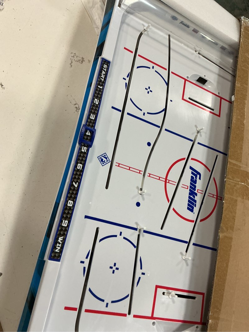 Condition photo showing Good Condition for Franklin Sports Tabletop Rod Hockey Game - Gameroom Ice Hockey Table Game for Kids + Adults - Arcade Style Board + Mini Pucks Included