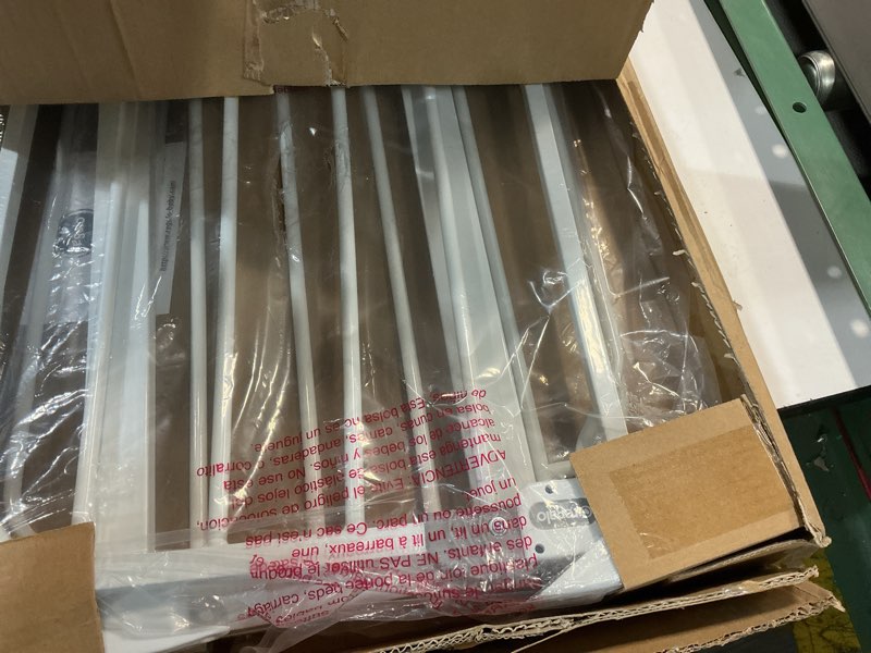 Condition photo showing New/Like New for regalo safety 36" extra tall and 49" wide baby gate for doorways & bottom of stairs, pressure mounted walk through baby gate for toddlers & pets, tested & safe, american designed, american owned white 29-49"w x 36"h