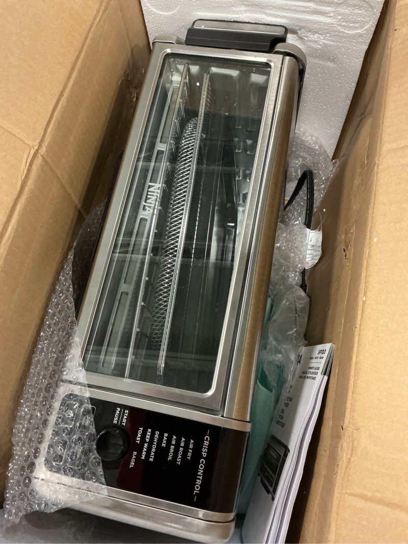 Condition photo showing As Is for Ninja Digital Air Fry Countertop Oven, 8-in-1 Functionality, 1800W, Flip-Up Design, XL Capacity, Air Fry Basket, Wire Rack & Crumb Tray, Silver, SP101 8-in-1 Flip Oven