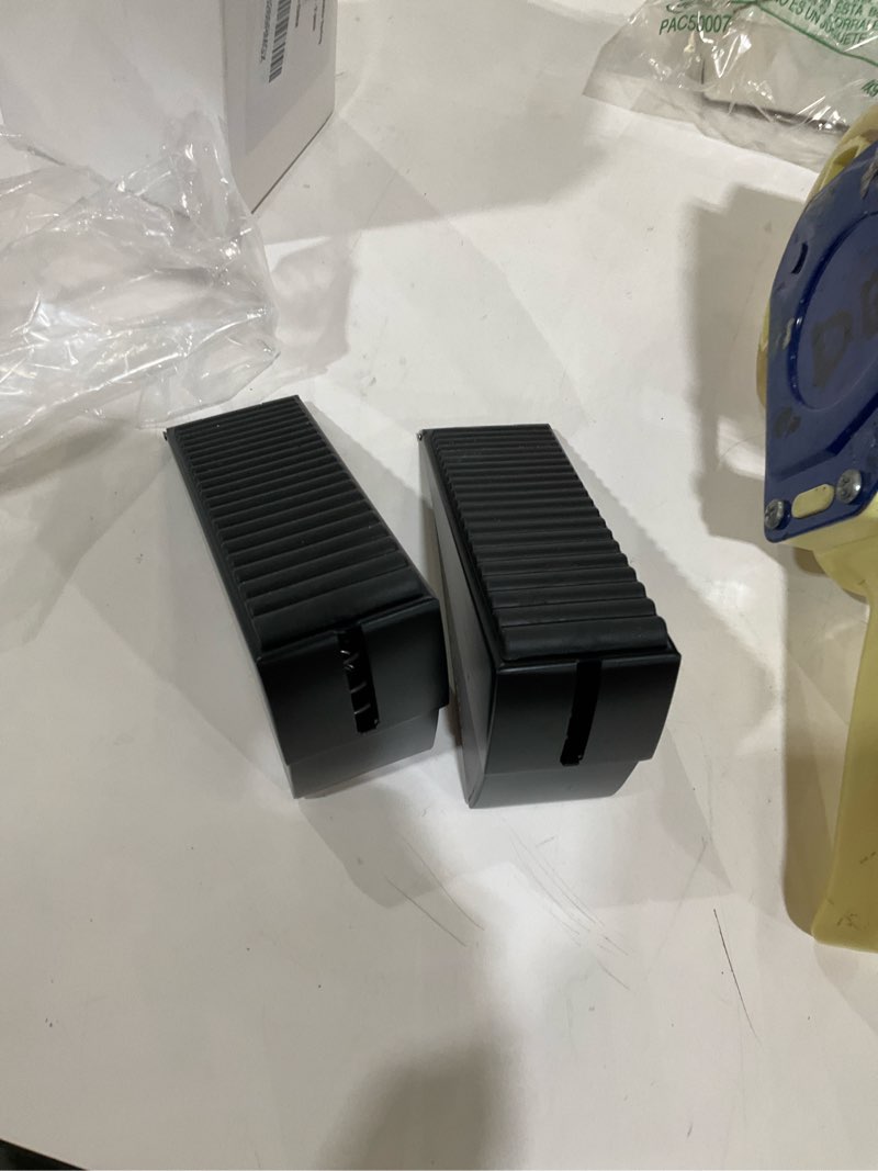 Condition photo showing As Is for Strongest Home 2 Pack XL Adjustable Door Stopper with Spring – Heavy Duty Wedge for Oversized, Thick & Heavy Doors, Anti-Slip Rubber Grip, Commercial, Home & Outdoor Use on Carpet, Wood & Tile - Black Spring Black 2 Pack