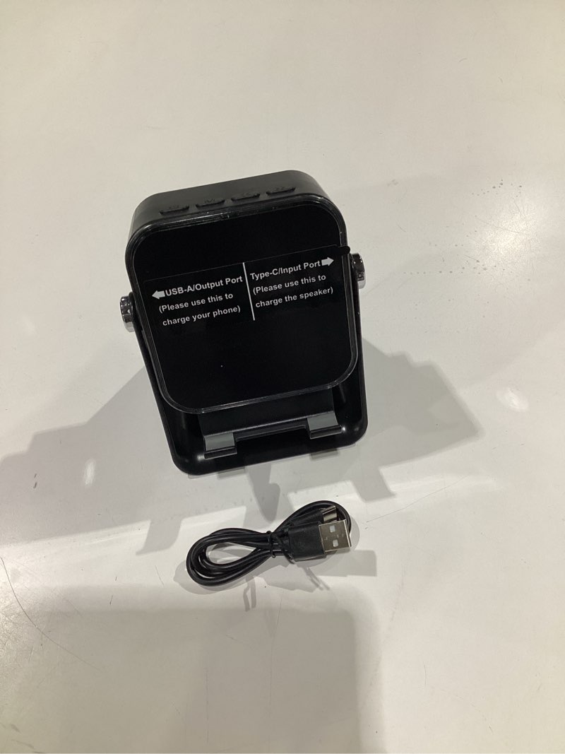 Condition photo showing Good Condition for Wireless Induction Speaker 5-in-1 Bluetooth Speaker with Phone Stand,Stereo Sound, 3500mAh Rechargeable, 8 RGB Ambient Light, 360° Adjustable Holder for iPhone/Android/iPad,Gifts for Men Women (Black)