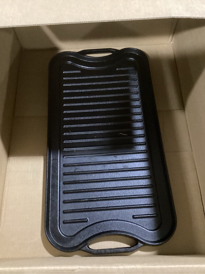 Condition photo showing Good Condition for Amazon Basics Pre-Seasoned Cast Iron Reversible Rectangular Grill/Griddle, Black, 20 x 10.63 x 0.98 inch