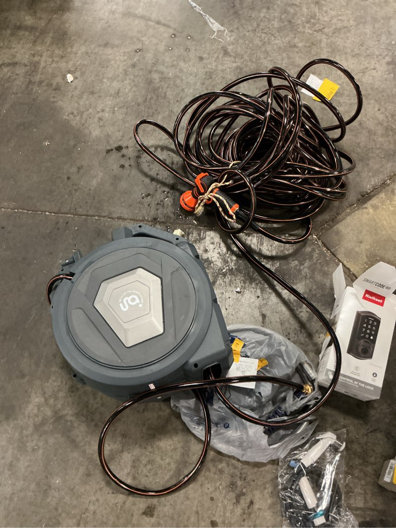 Condition photo showing As Is for giraffe tools plastic 100-ft wall-mount hose reel