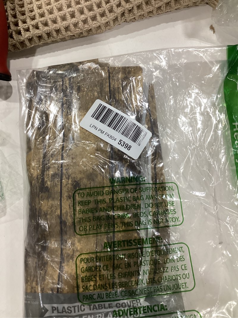 Condition photo showing New/Like New for Creative Converting TABLECOVER PL 54" X 108" AOP BROWN Wood Grain Design Plastic Tablecloth, 54 x 108, Multicolor